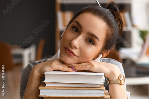 Beautiful female student wi...