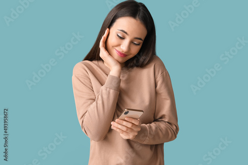 Beautiful young woman with ...