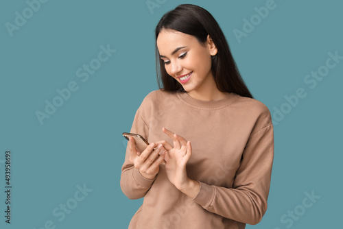 Beautiful young woman with ...