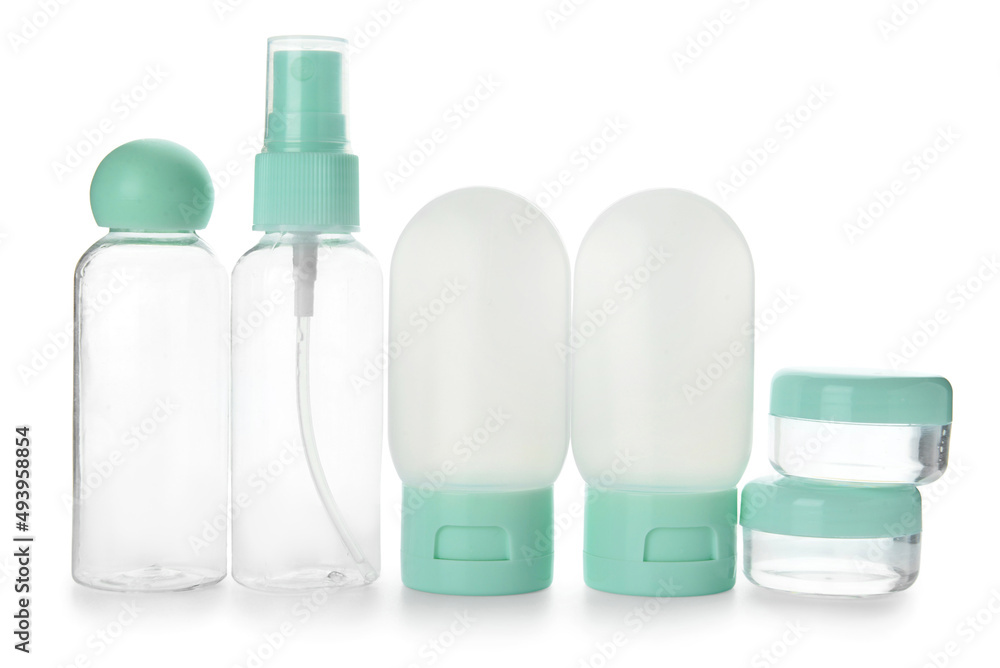 Set of empty travel cosmetic bottles and jars on white background Set of empty travel cosmetic bottles and jars on white background