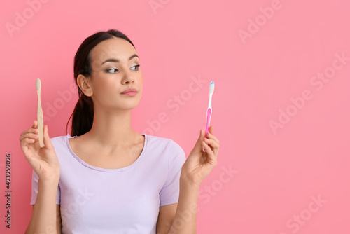Thoughtful young woman with...