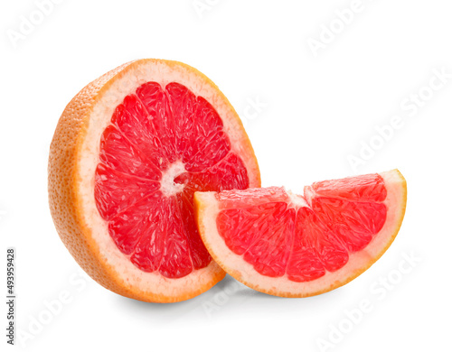 Tasty cut grapefruit on white background