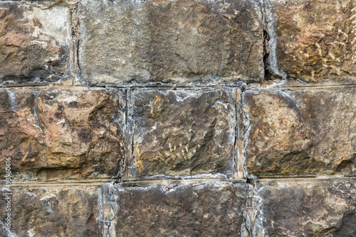 Stone wall background. Stone masonry. Texture of a stone wall.