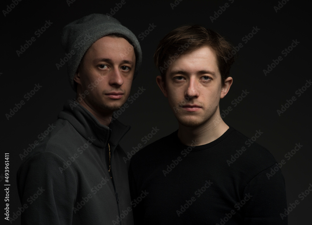 portrait of two Ukrainian twin brothers with confident emotions portrait of two Ukrainian twin brothers with confident emotions