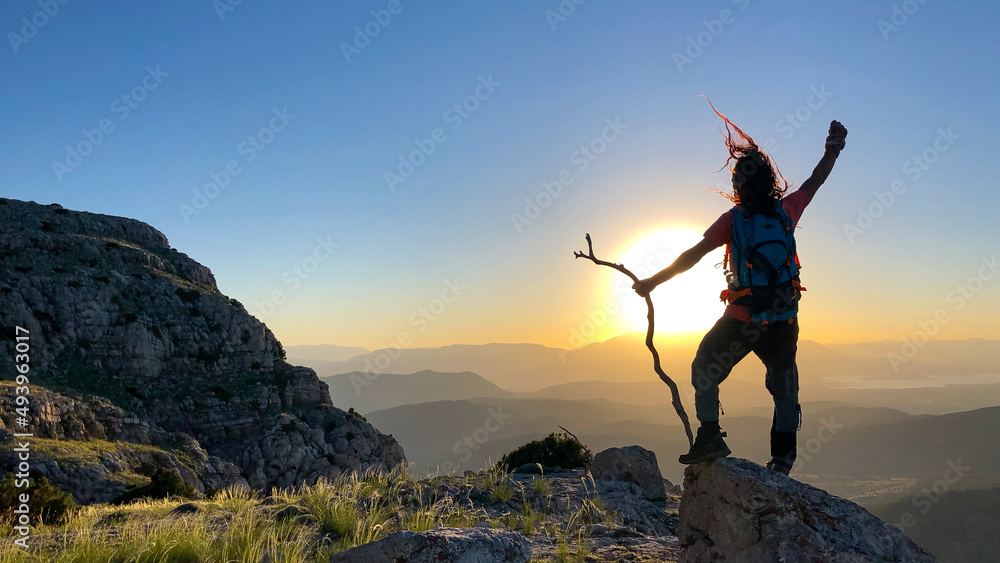 successful climb of mountaineer in peak mountains and victory of reaching goal successful climb of mountaineer in peak mountains and victory of reaching goal