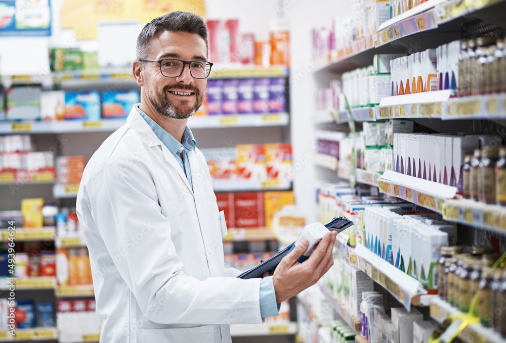 Weve got a brand new range of stock in. Portrait of a mature pharmacist doing inventory in a pharmacy. Weve got a brand new range of stock in. Portrait of a mature pharmacist doing inventory in a pharmacy.