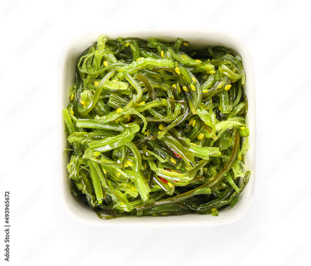 Bowl with healthy seaweed salad on white background Bowl with healthy seaweed salad on white background