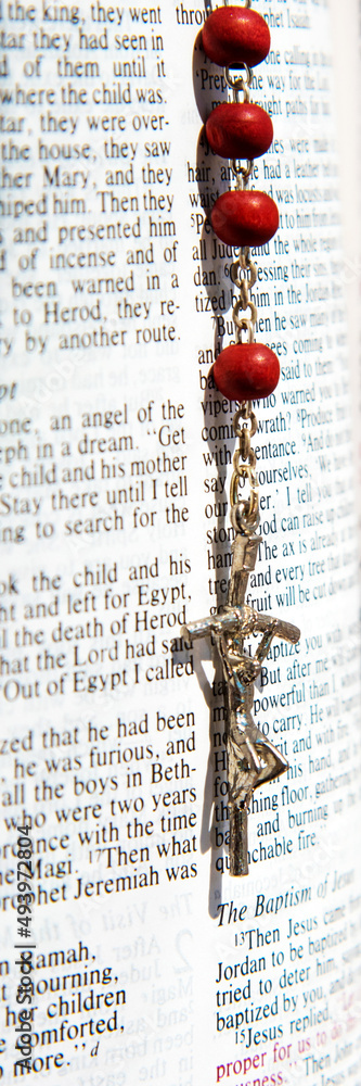 wooden crucifix with a crucifix on the pages of the Bible