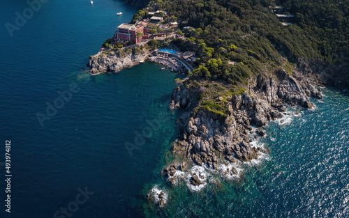 Rocky cape at sea and coastline (aerial drone photo). Mediterranean, Ischia island, Italy