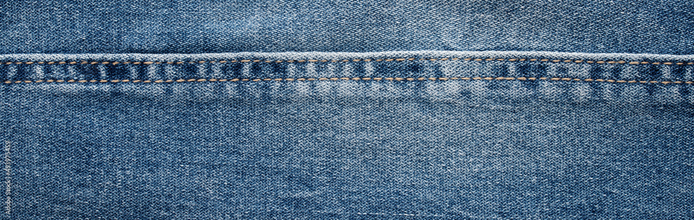 	
texture of blue jeans denim fabric background	
