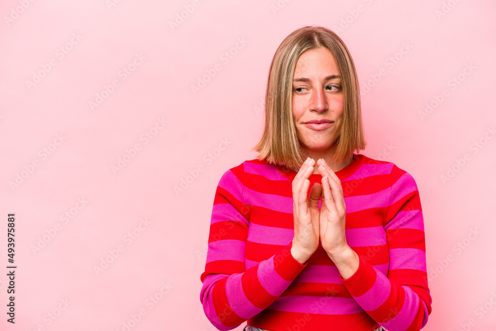 Young caucasian woman isolated on pink background making up plan in mind, setting up an idea. Young caucasian woman isolated on pink background making up plan in mind, setting up an idea.