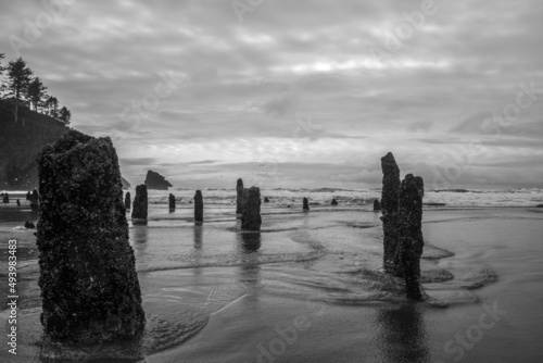 Photo of rocks standing on ocean pier photo