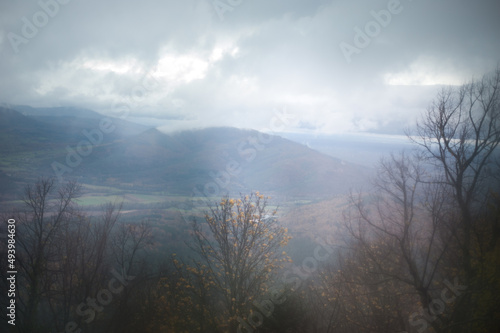 fog and low heavy clouds over a valley
