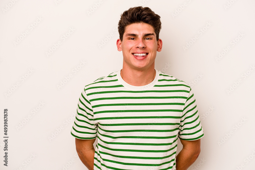 Young caucasian man isolated on white background happy, smiling and cheerful. Young caucasian man isolated on white background happy, smiling and cheerful.