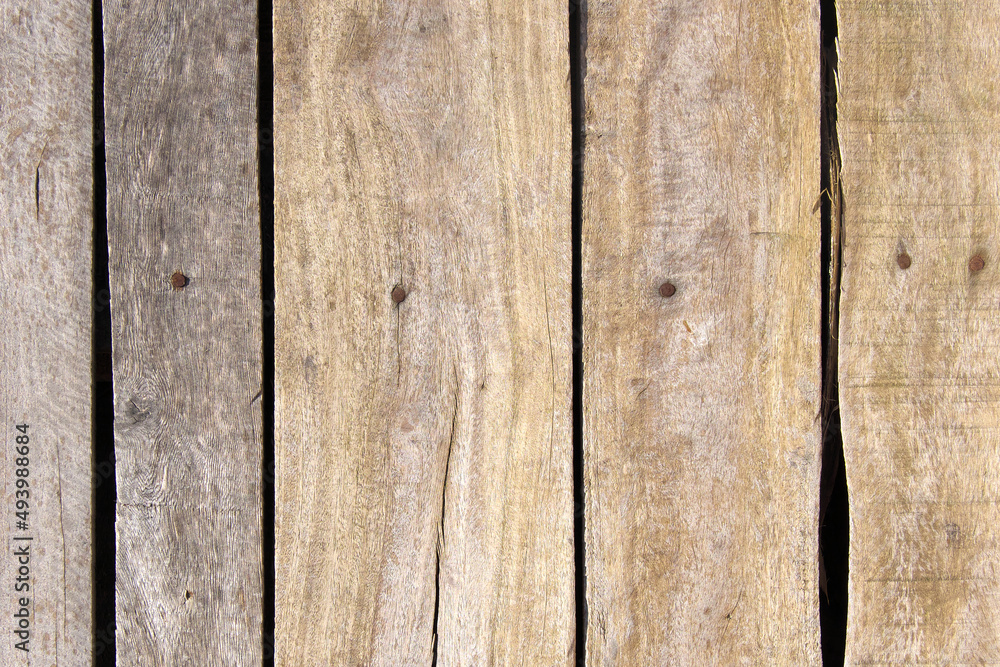 Fototapeta premium Wooden background. Old wooden pallet top view.