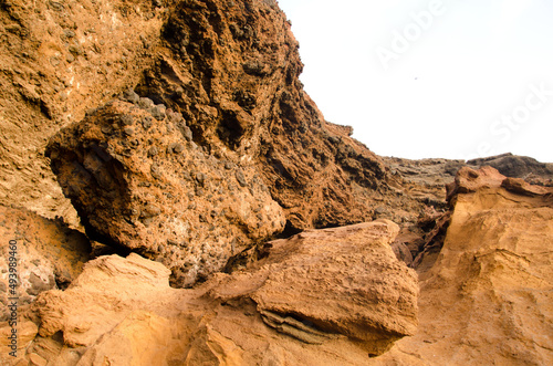 Rocky cliff in Caleton Oscuro. Montana Clara. Integral Natural Reserve of Los Islotes. Canary Islands. Spain.