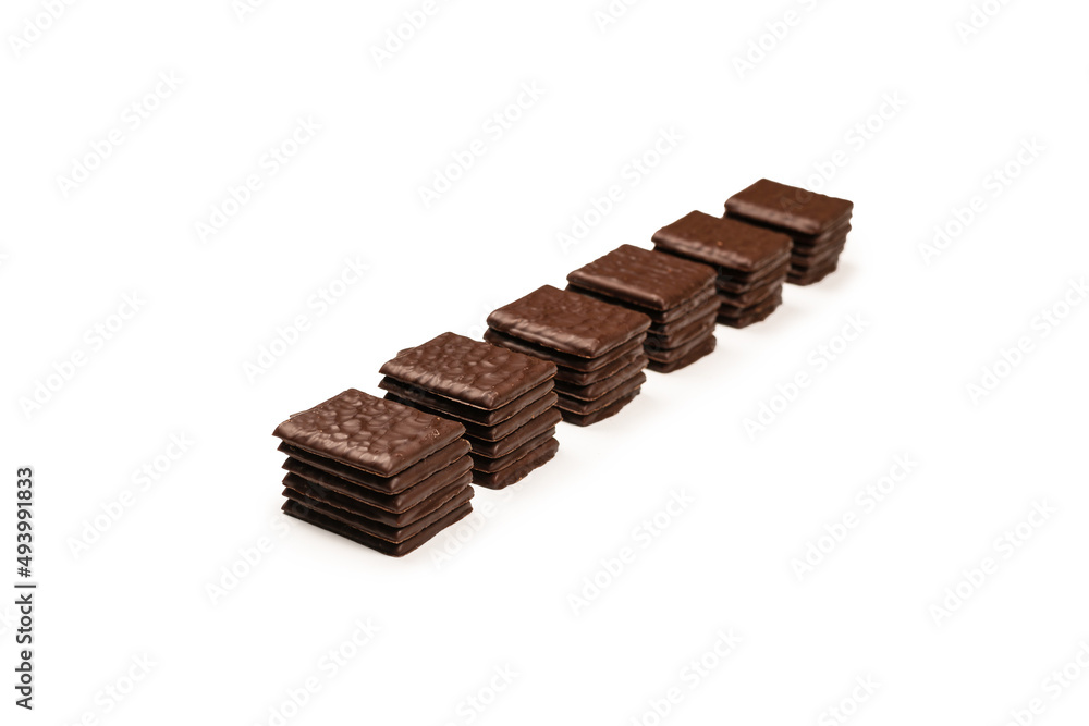 Dark chocolate candies isolated on white background. Dark chocolate candies isolated on white background.