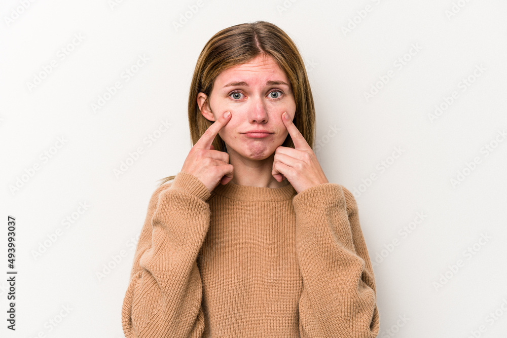 Young russian woman isolated on white background crying, unhappy with something, agony and confusion concept. Young russian woman isolated on white background crying, unhappy with something, agony and confusion concept.
