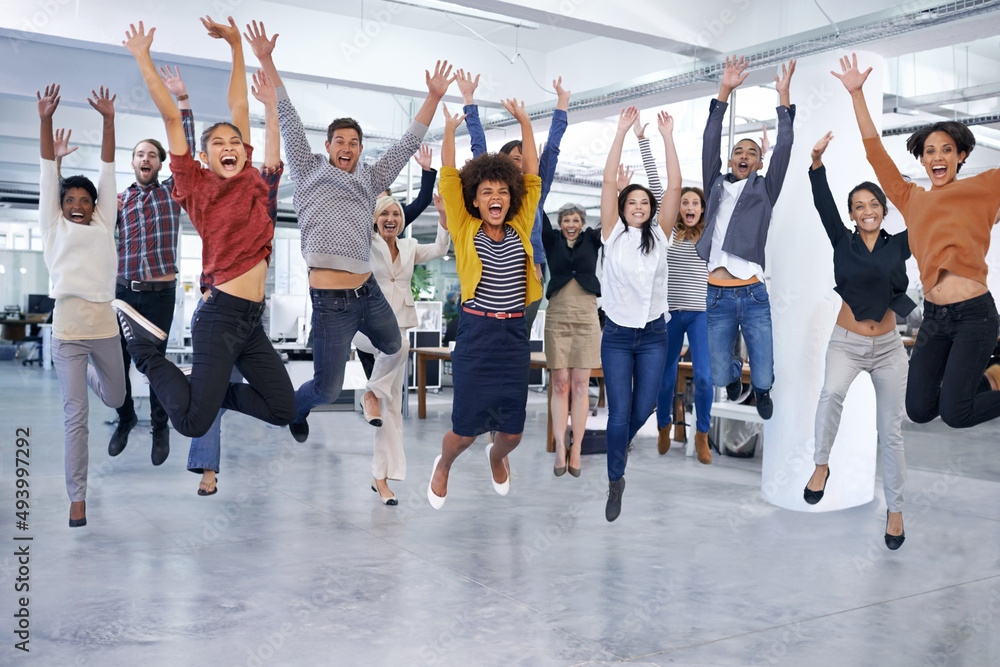 Fototapeta premium Theyll jump at the chance to help you out. Shot of office staff jumping.