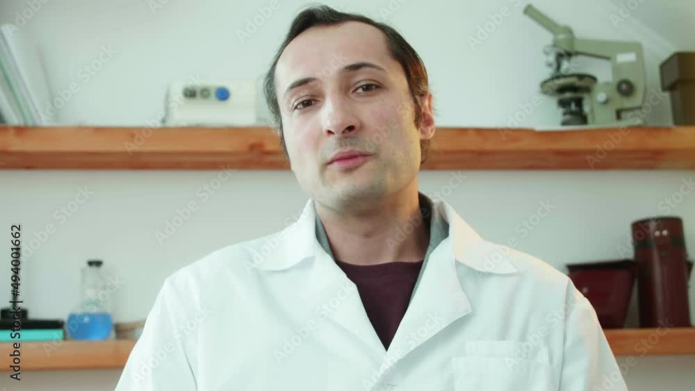 Family medicine in a pandemic. The doctor surveys the patient and gives medical advice via the Internet by writing down the information received with a stylus in a smartphone Family medicine in a pandemic. The doctor surveys the patient and gives medical advice via the Internet by writing down the information received with a stylus in a smartphone