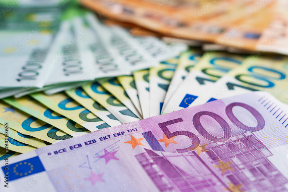 Lot of paper banknotes five hundred one hundred and fifty euro. Top view. Pile of money. Close-up Lot of paper banknotes five hundred one hundred and fifty euro. Top view. Pile of money. Close-up