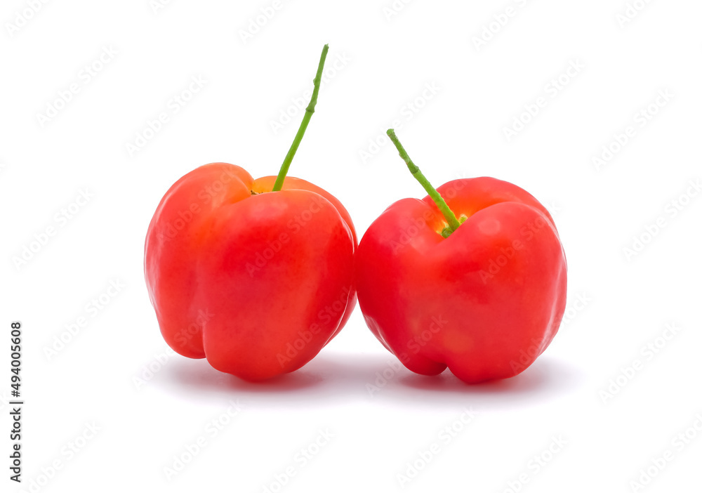 Fresh red acerola cherries with green leave isolated on white background. Fresh red acerola cherries with green leave isolated on white background.