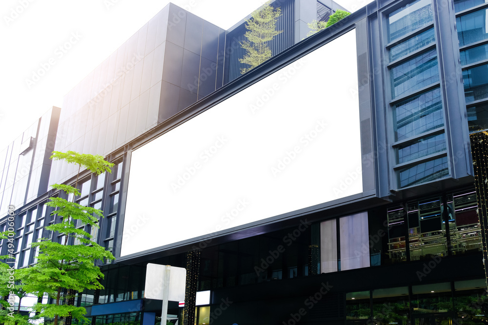 Billboard mock-up on the building. Template of empty information billboard, Mock-up of a city banner placeholder and poster. Billboard mock-up on the building. Template of empty information billboard, Mock-up of a city banner placeholder and poster.