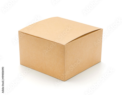 Brown cardboard box isolated on white background with tape. Suitable for packaging. © Nudphon