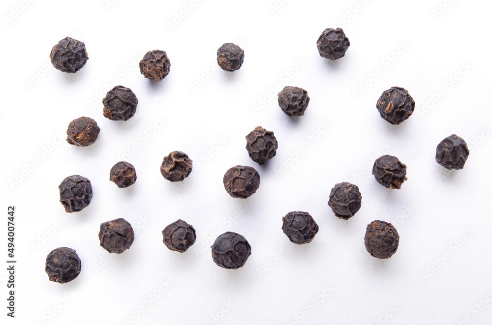 Obraz premium Black pepper isolated on white background with shadow