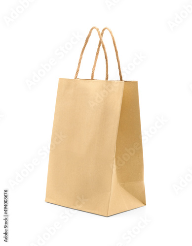 Recycled craft paper shopping bag isolated on white background.
