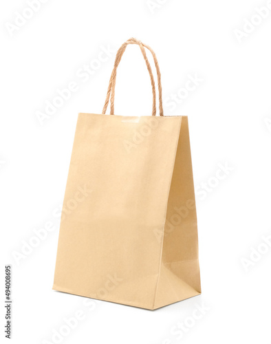 Recycled kraft paper shopping bag with tape isolated on white background.