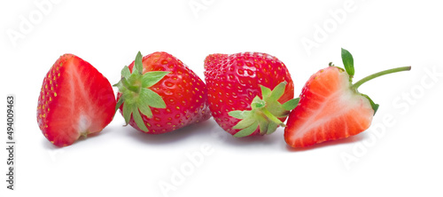 Fresh red ripe strawberries with leaf isolated on white background.
