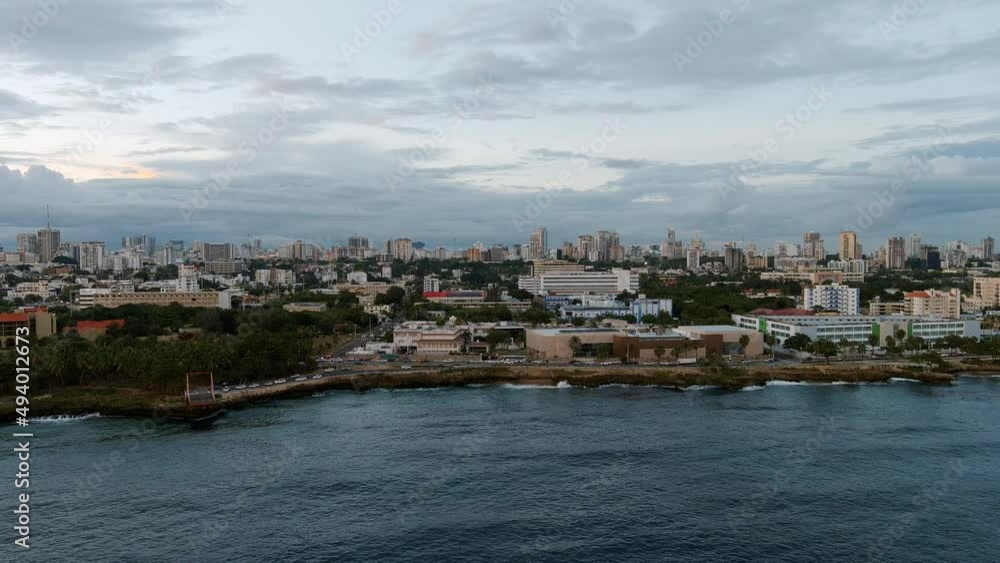 Malecon of Santo Domingo at sunset. Aerial sideways Malecon of Santo Domingo at sunset. Aerial sideways