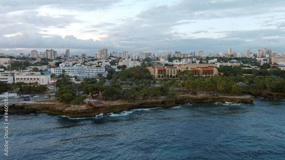Jagged and rocky coast along Malecon of Santo Domingo in Dominican Republic. Aerial sideways Jagged and rocky coast along Malecon of Santo Domingo in Dominican Republic. Aerial sideways