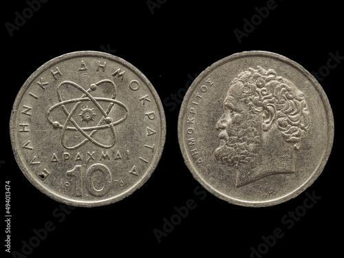 Both sides of vintage Greek drachma coins. photo