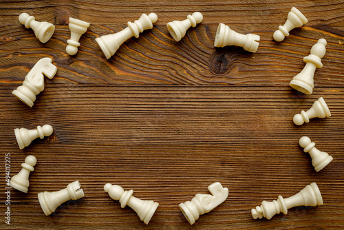 Flatlay of chess pieces, top view. Chess game as victory concept