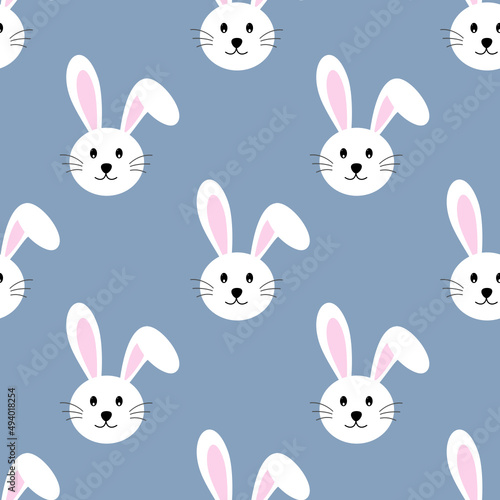 Rabbit seamless pattern on blue background.