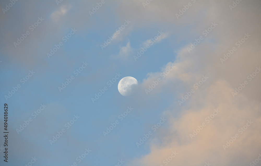 moon with cloudy sky pastel colors