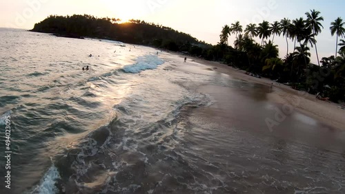 Wallpaper Mural Flying Over People swimming Surfing Doing Water Activities On Beautiful Long Bay, Sri Lanka  Torontodigital.ca
