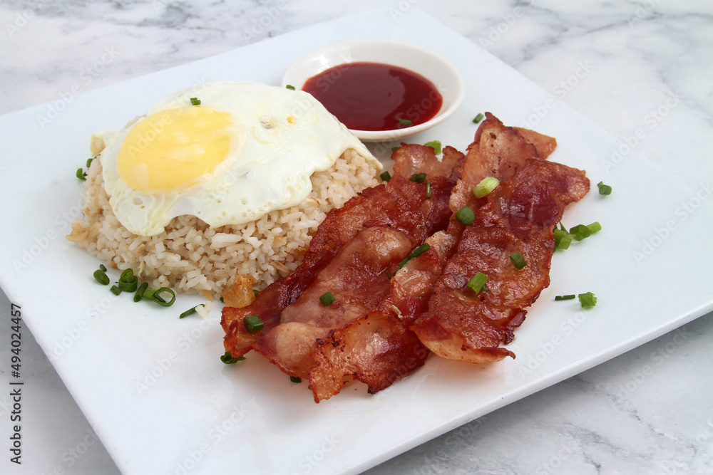 Freshly cooked Filipino food called Bacsilog Freshly cooked Filipino food called Bacsilog