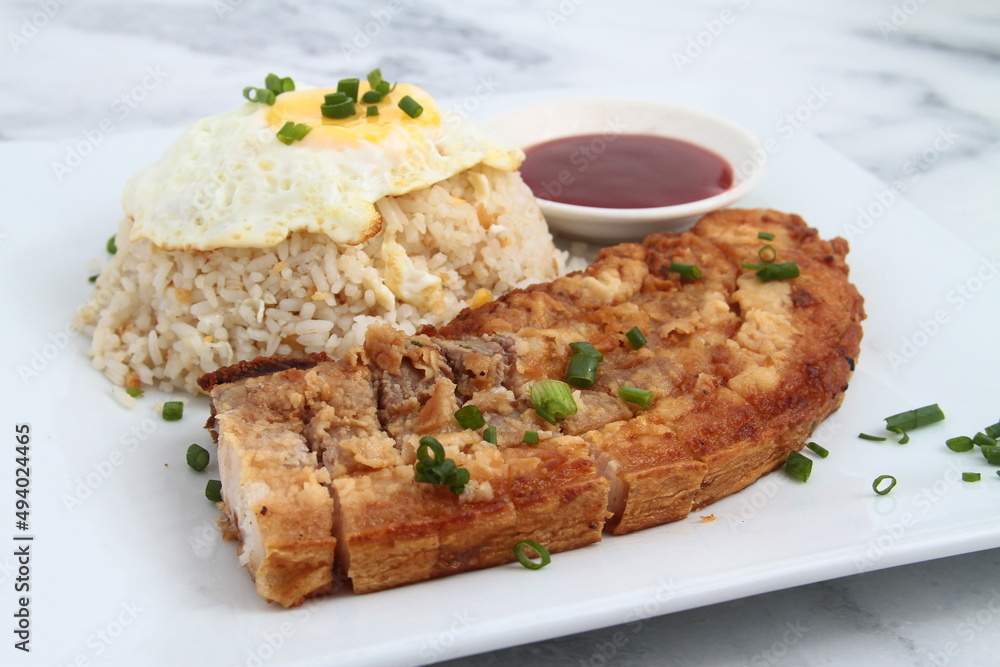 Freshly cooked Filipino food called Lechonsilog Freshly cooked Filipino food called Lechonsilog