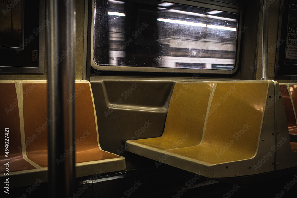Colorful seats inside a subway