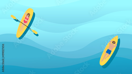 Summer time background. Couple young woman and man lying down sunbathe on surfboard in ocean for summer. Top view
