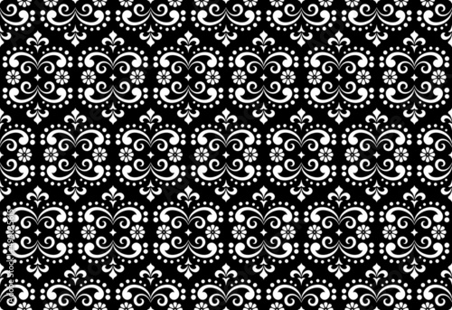 Wallpaper in the style of Baroque. Seamless vector background. White and black floral ornament. Graphic pattern for fabric, wallpaper, packaging. Ornate Damask flower ornament