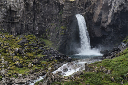 Closeup of beautiful landscape with a waterfall on a small mountain river in Iceland
