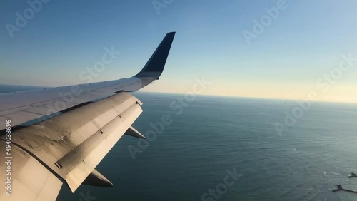 Images from the plane slowly descending from the sky.