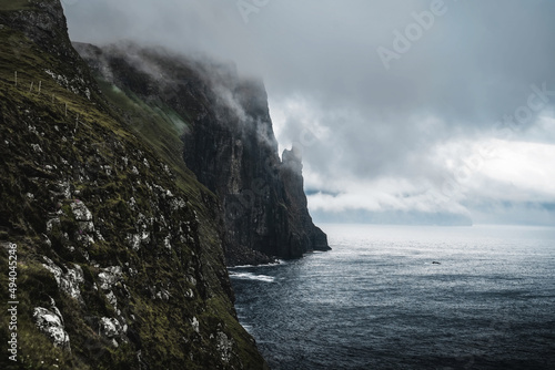 Witches Finger cliffs from Trollkonufingur viewpoint. Vagar island, Faroe Islands, Denmark. photo