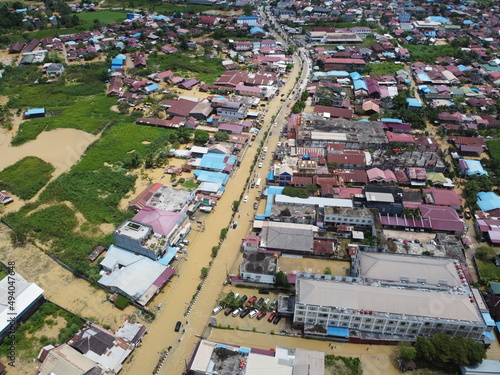 Aerial view of Situation Flood in sangatta city, east kutai, east Kalimantan, Indonesia in 21 March 2022. Floods hit homes and highways, disrupting transportation, floods because high rainfall.