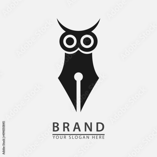 owl eye paired with ballpoint pen for logo icon study.