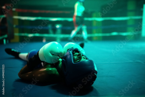 Canvas Print Close-up of female boxer knocked out in final round